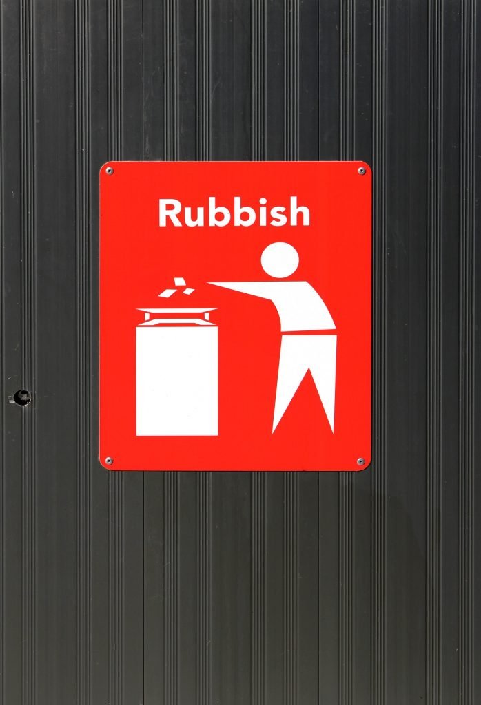 Rubbish sign on a trash can